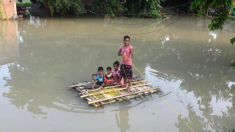 Assam floods: 8 dead, 5 go missing as heavy rain swamps over 1,000 villages  - Top Stories News