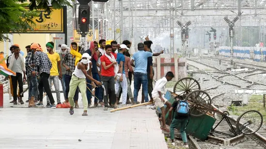 People vandalise railway property at Danapur Railway Station during a protest against the Agnipath army recruitment scheme. (Santosh Kumar /Hindustan Times)